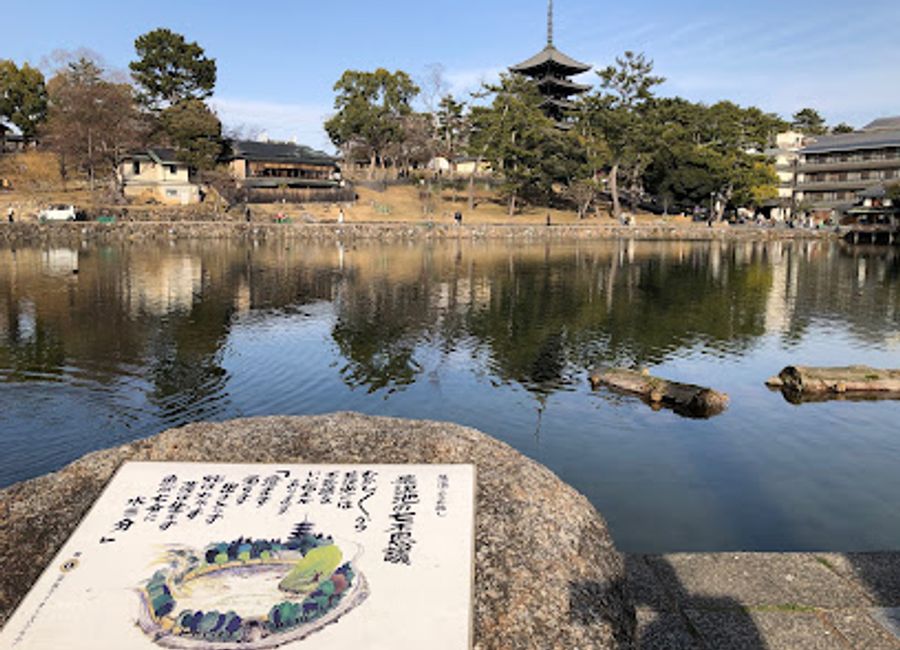 Explore the Sarusawa-ike Monument in Nara, Japan, a stunning stone carving surrounded by tranquil waters, perfect for art lovers and history enthusiasts.