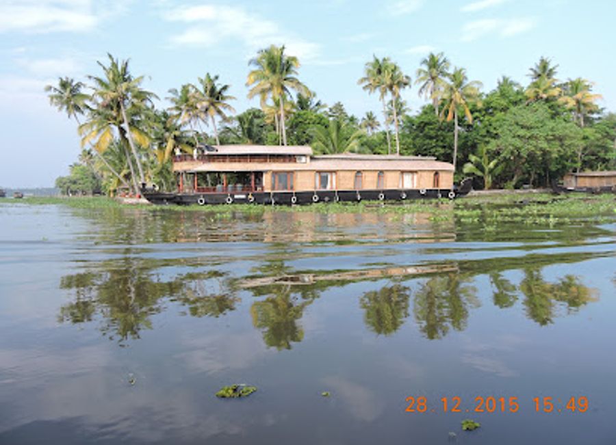 Explore the breathtaking Kumarakom Backwaters, a serene haven of nature in Kerala, known for its stunning landscapes and unforgettable houseboat experiences.
