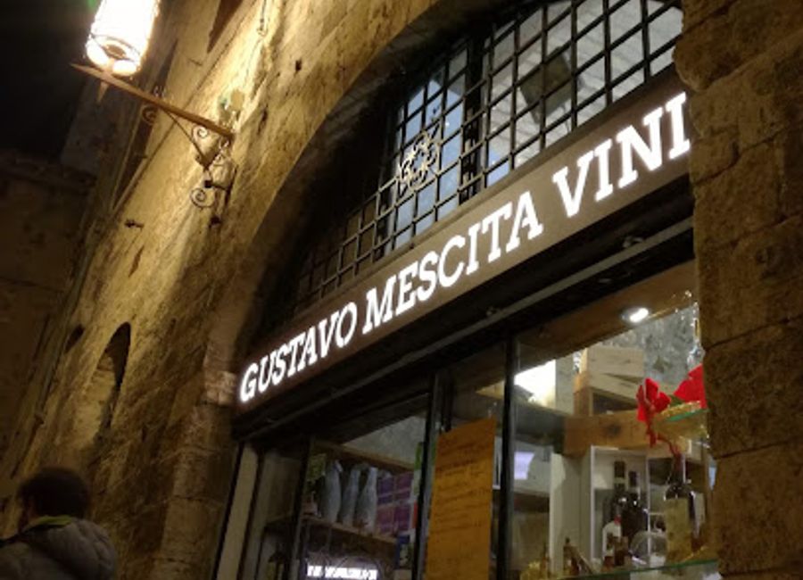 Discover the finest local wines and authentic Italian cuisine in the charming setting of Gustavo Mescita Vini Enoteca in San Gimignano.