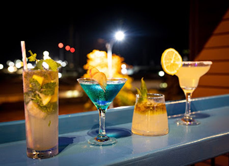 Experience the vibrant nightlife at Next Level Bar Lounge and Entertainment in Victoria, Seychelles, where cocktails meet entertainment in a lively atmosphere.