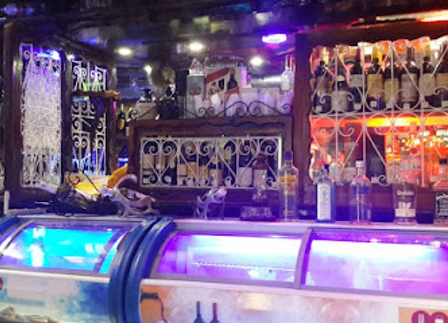 Experience the vibrant flavors of Chefchaouen at Bar Oum Rabie, a cozy grill and wine bar offering delicious dishes and a stunning ambiance.