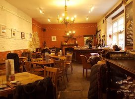 The Snug Restaurant & WOOD-FIRED PIZZERIA
