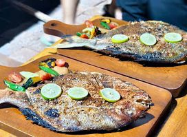 Cardamon wood fire seafood Restaurant
