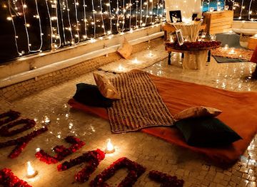 india/vadodara/restaurant/friends-factory-cafe-private-candle-light-dinner