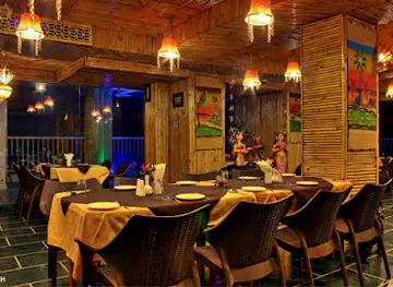 The Sitting Elephant - A Rooftop Restaurant Overlooking River Ganga