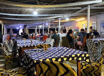 the-gambia/sabach-sanjal/restaurant/john-raymond-s-beach-bar-and-restaurant