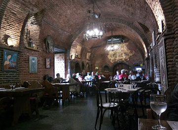 georgia/khevi/restaurant/old-city-wall