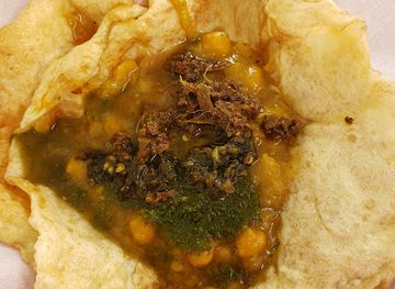 trinidad-and-tobago/scarborough/restaurant/nadia-s-doubles-empire