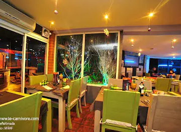 Le Carnivore - Restaurant Bar Lounge