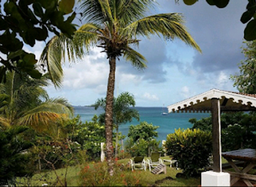 grenada/black-bay-beach/restaurant/bogles-round-house-restaurant-cottages