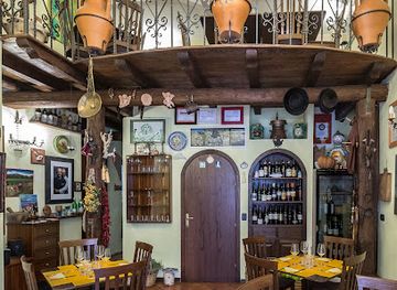 italy/taormina/restaurant/tischi-toschi-taormina