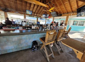 the-bahamas/crooked-island/restaurant/the-green-parrot-harbour-front