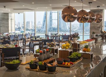 bahrain/manama/restaurant/atmosphere-restaurant-at-wyndham-grand-manama
