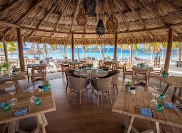 curacao/playa-santa-cruz/restaurant/coast-beach-restaurant-blue-bay-curacao-golf-beach-resort