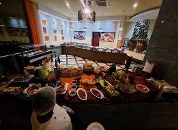 uganda/entebbe/restaurant/tides-restaurant