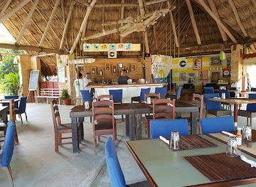 belize/lighthouse-reef-atoll/restaurant/rhum-shack-at-hopkins-bay-resort