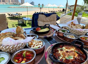 qatar/al-jassasiya-rock-carvings/restaurant/nassayem-qatar-restaurant