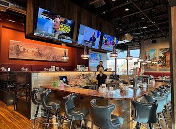 Atomic Cowboy home of Denver Biscuit Co & Fat Sully's NY Pizza