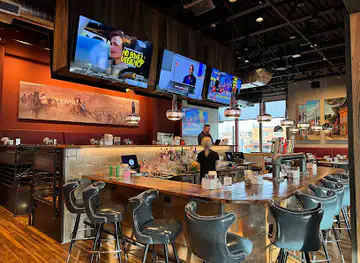 Atomic Cowboy home of Denver Biscuit Co & Fat Sully's NY Pizza