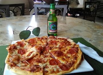 antigua-and-barbuda/st-john-s/restaurant/xcape-bar-caribbean-cuisine