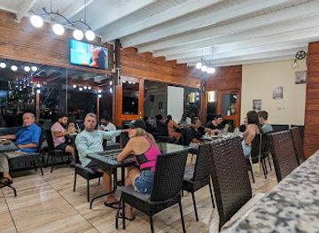 grenada/grand-anse-beach/restaurant/east-west-restaurant-bar