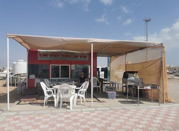 oman/mirbat/restaurant/mahallat-shawy-alasmak-walmaokulat-albahriya