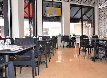 morocco/rabat/hassan-tower/restaurant/coq-magic