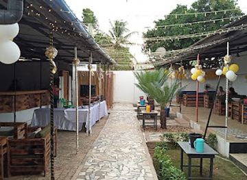 togo/lome/null/restaurant/le-much