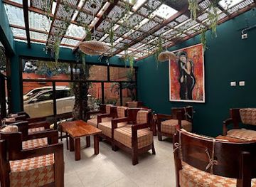 guinea/conakry/restaurant/nomad