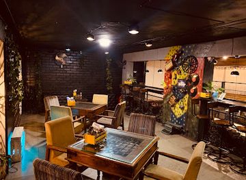 india/ahmedabad/restaurant/ristretto-behind-the-rods