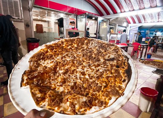 iraq/najaf/restaurant/neneo-restaurant-kibbeh-pizza-meat-dough