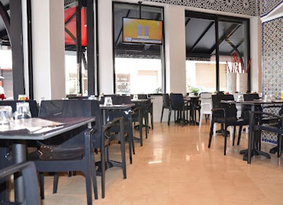 morocco/rabat/hassan-tower/restaurant/coq-magic