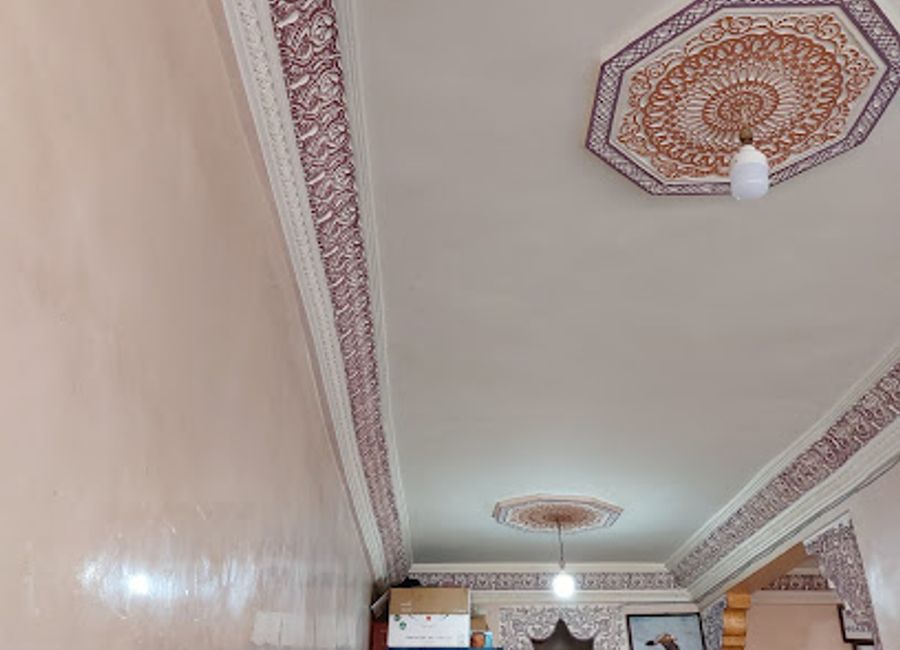 Discover Café Taghazout in Imlil - A perfect family-friendly spot offering delicious Moroccan cuisine amidst breathtaking mountain views.