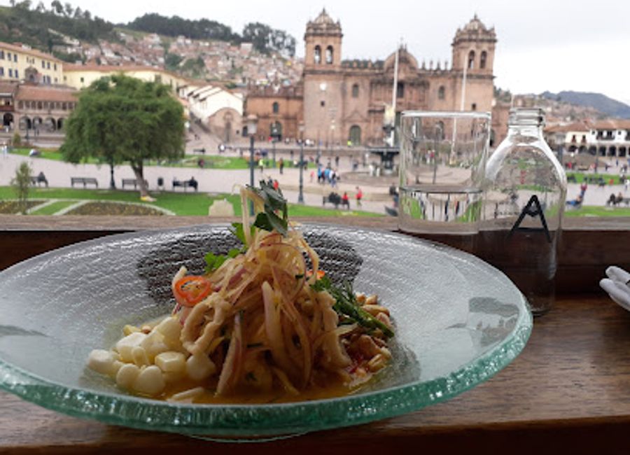 Experience authentic Peruvian flavors at Calle del Medio Restaurante Bar in Cusco's historic center.