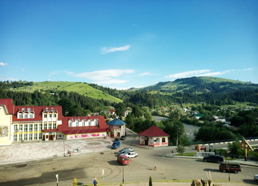 Experience authentic Ukrainian cuisine with breathtaking views at Panorama Verhovel in Verkhovyna's stunning Carpathian Mountains.