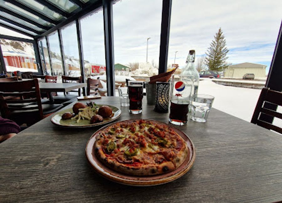 Discover Systrakaffi: A cozy restaurant in Kirkjubæjarklaustur serving authentic Icelandic dishes with fresh local ingredients.