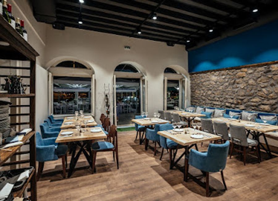 Experience authentic Greek seafood at Savouras in Nafplio, where fresh flavors meet stunning waterfront views.