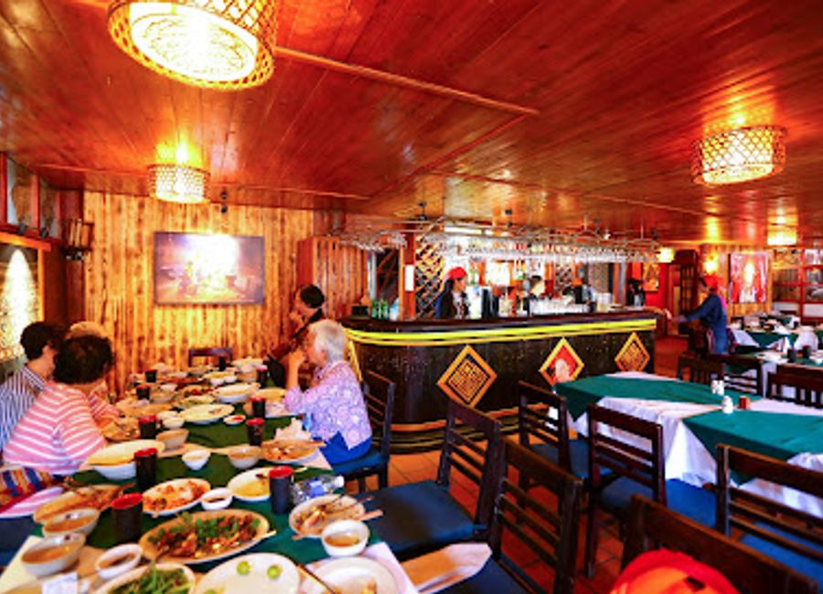 Experience authentic Dzao cuisine at Red Dzao House in Sa Pa - a culinary journey through Vietnam's rich flavors.
