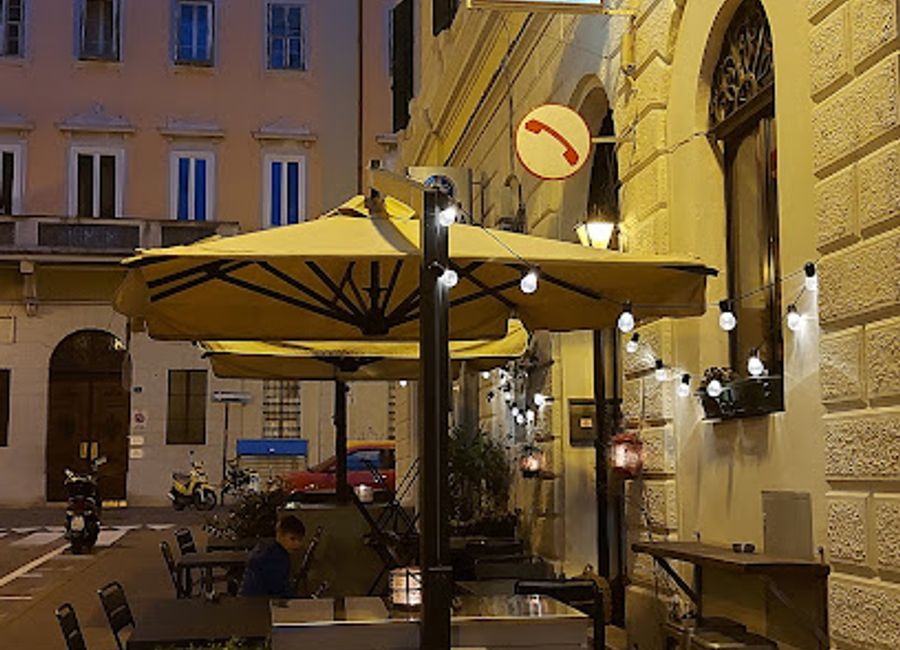 Experience authentic Mediterranean flavors at Osteria Salvagente in Trieste, where Italian and seafood dishes come together in a cozy atmosphere.