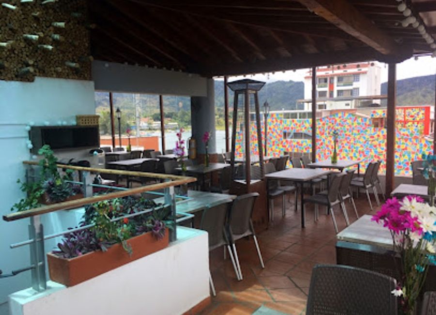 Experience exquisite dining with breathtaking views at Restaurante Terraza Blue in Guatapé, Colombia - a culinary oasis amidst nature's beauty.