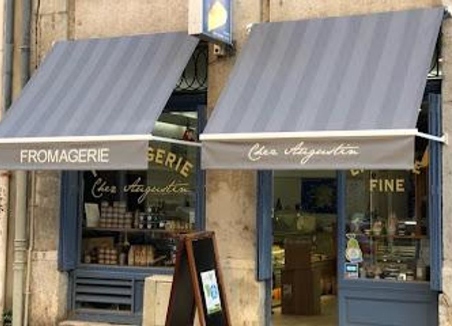 Discover gourmet delights at Chez Augustin in Lyon - your destination for artisanal cheeses, fine wines, and exquisite gift baskets.