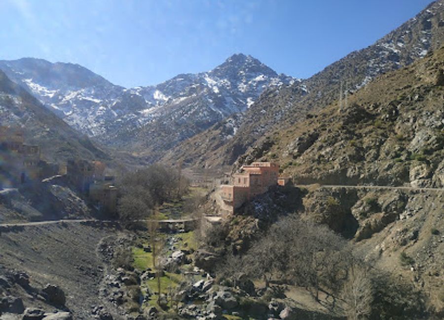 Experience authentic Moroccan cuisine amidst stunning mountain views at Restaurant Cascade Ait Misan in Aroumd.