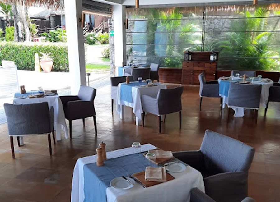 Experience exquisite dining at Paris Seychelles in Bel Ombre - where local flavors meet elegant presentation amidst breathtaking views.