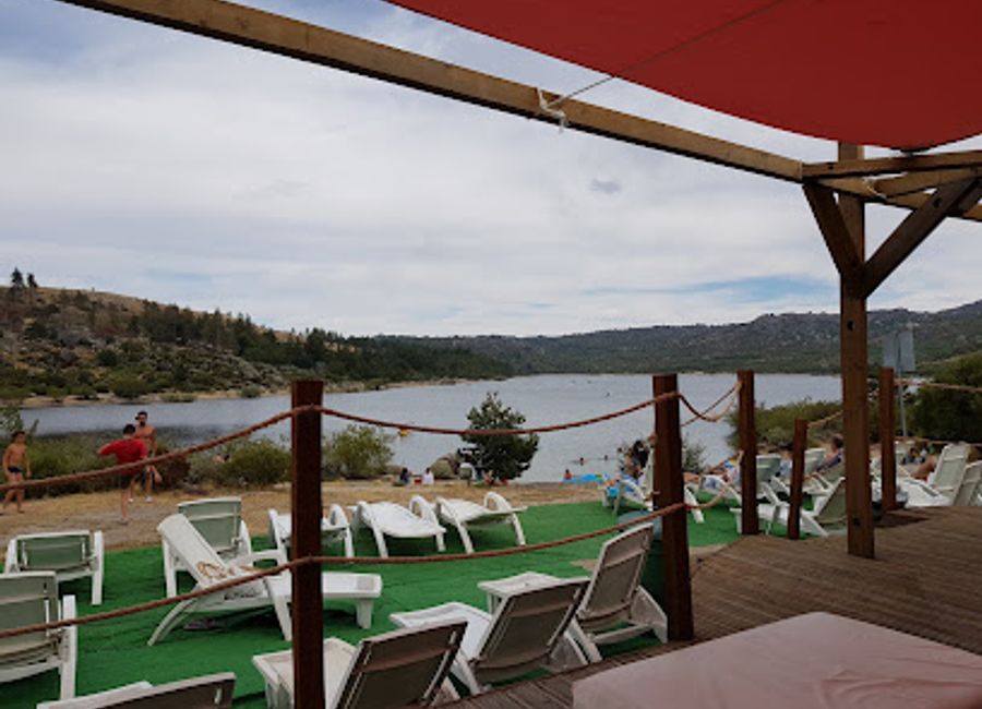 Discover authentic Portuguese flavors at Restaurante Vale Do Rossim amidst stunning landscapes.