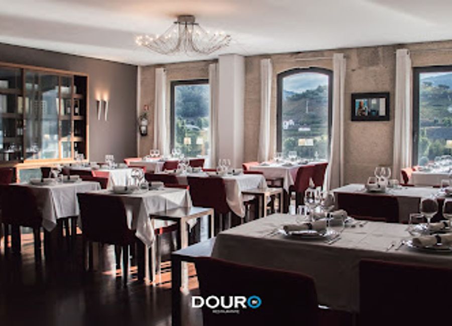 Experience authentic Portuguese cuisine at Douro In, where local flavors meet stunning views in Peso da Régua.