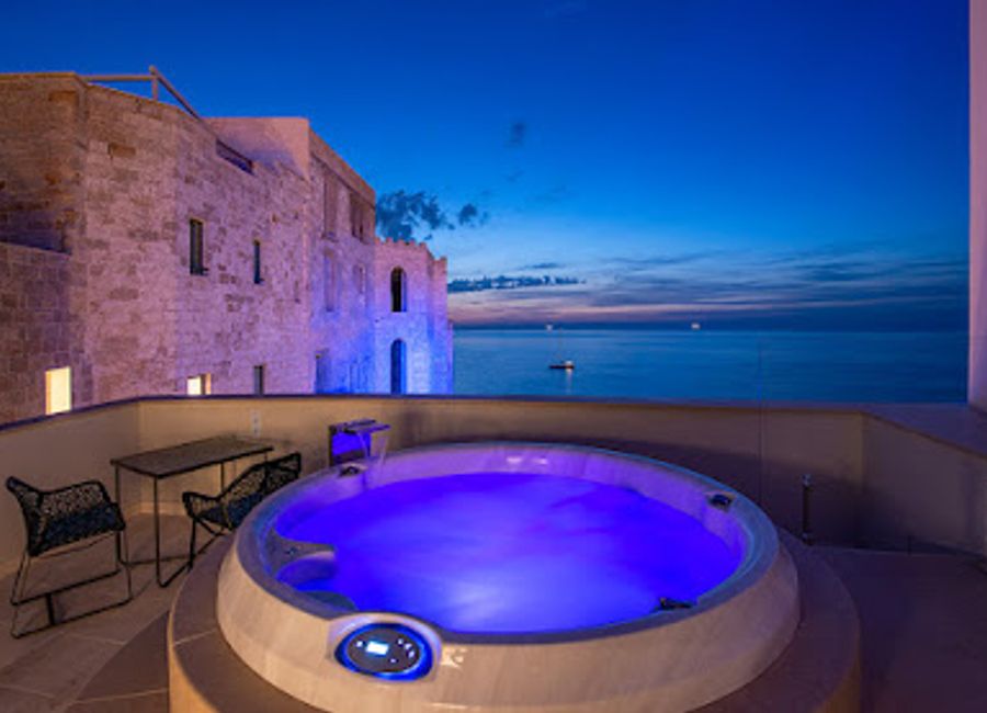 Experience exquisite Italian cuisine in a breathtaking cave setting overlooking the Adriatic Sea at Grotta Palazzese.