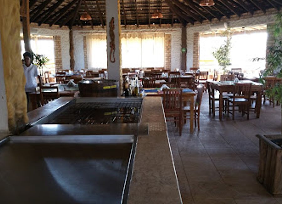 Experience exquisite Brazilian cuisine at Restaurant Windy Hill while soaking in panoramic views of Chapada dos Guimarães' stunning landscapes.