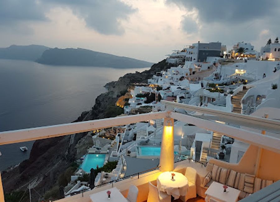 Discover authentic Greek flavors at Feredini in Oia—where exquisite cuisine meets breathtaking caldera views.
