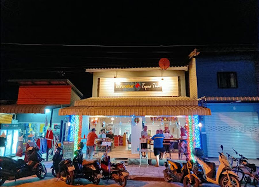 Discover the essence of Thai cuisine at Tapas Thai Bar Restaurant in Kanchanaburi—delicious dishes with stunning river views await you.