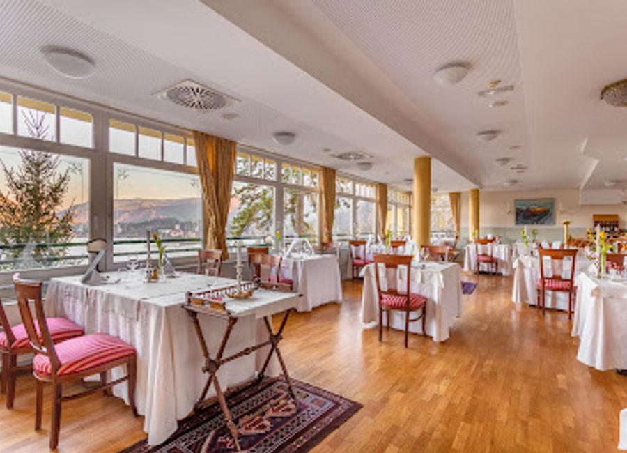 Experience exquisite Slovenian cuisine with stunning views at Restavracija 1906 in beautiful Bled.